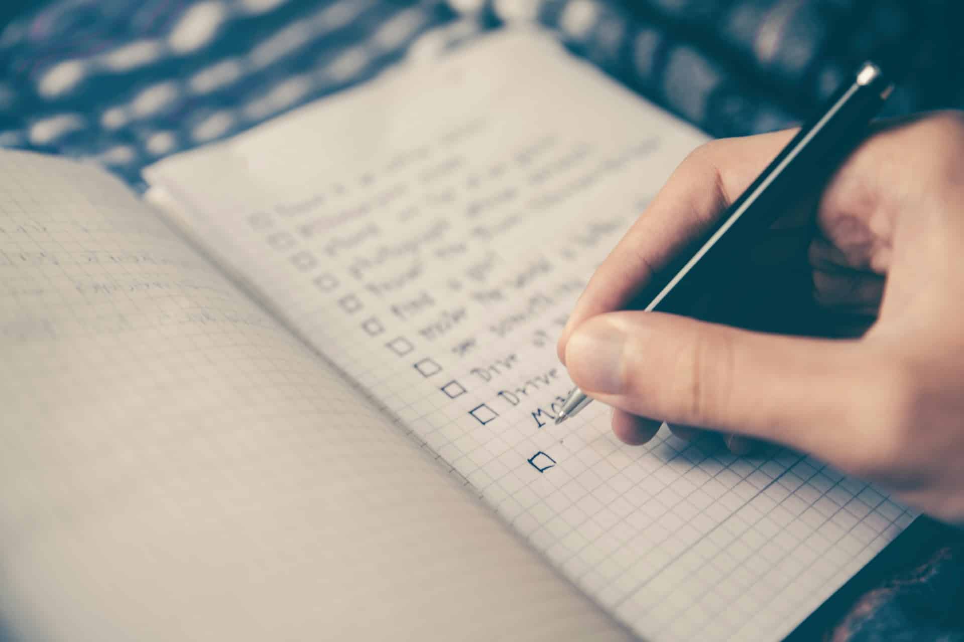 a person making a checklist