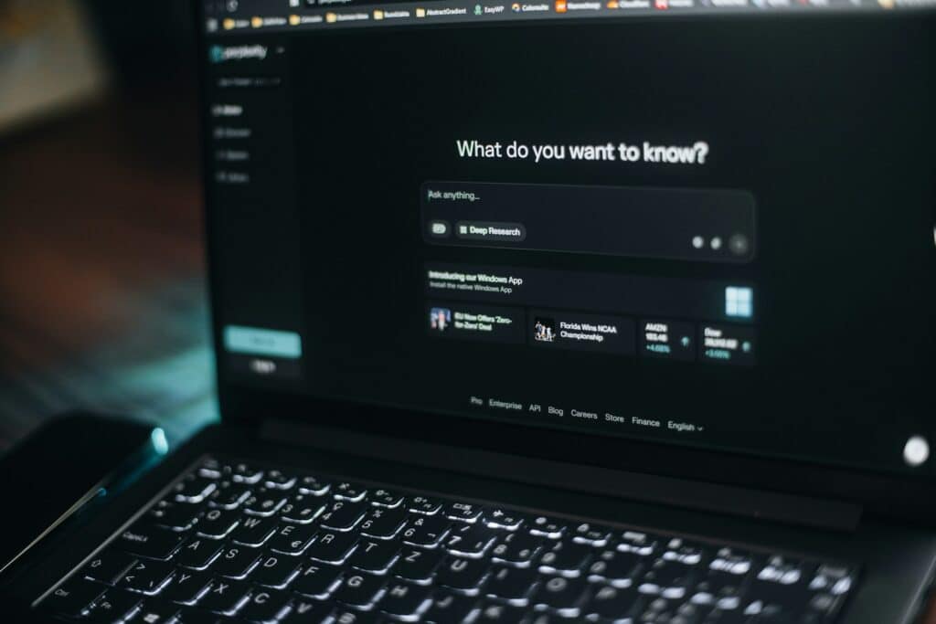 A laptop screen showing an AI search demonstrating how Ai affects hiring and termination in the workplace in Alberta.