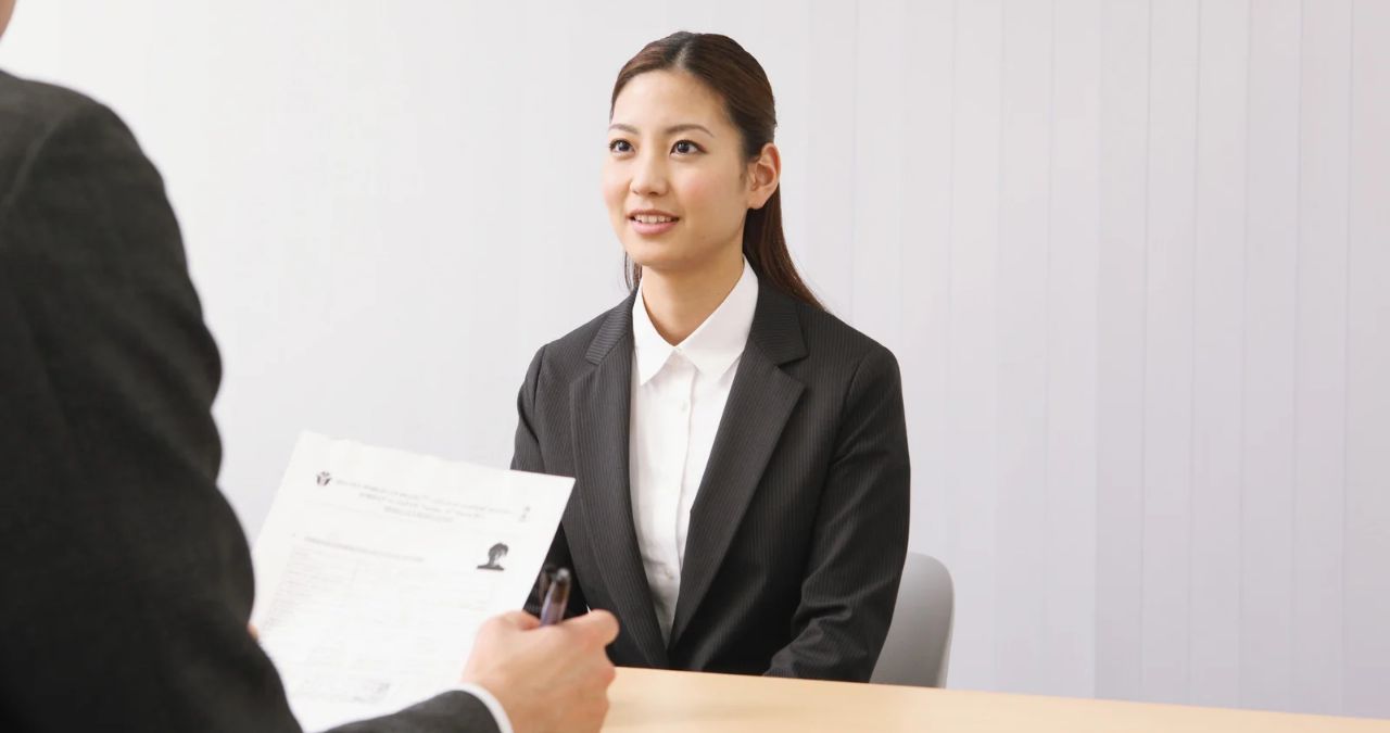 Employer conducting a job interview as part of the hiring process